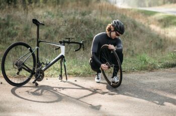 Cyclist fixing a flat tire